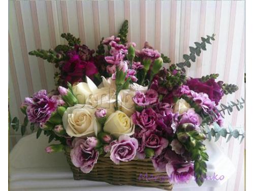 Arreglo en tonos rosas, morados y blancos