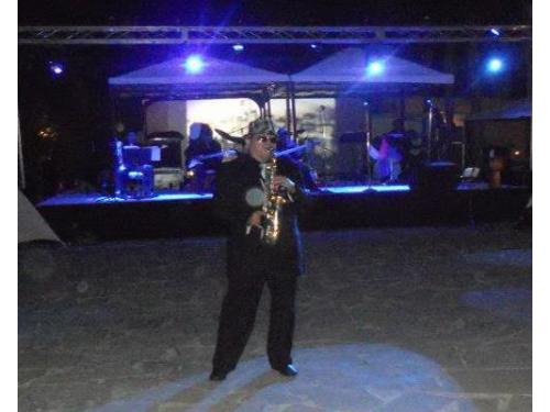 Saxofonista en tu cena