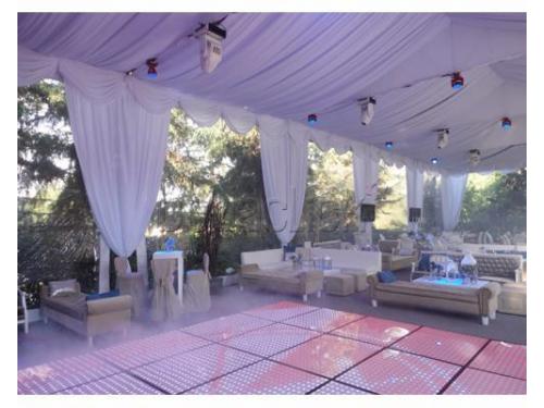 Montaje con carpa y piata iluminada