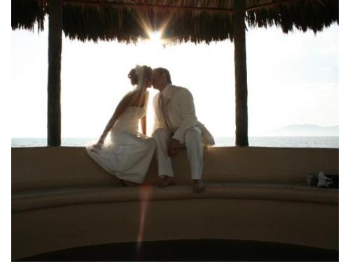 Besos bajo la palapa