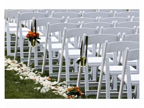 Decoración floral en sillas