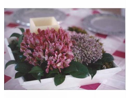 Arreglo floral con vela