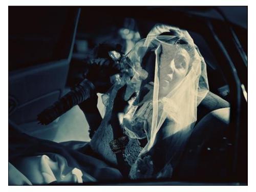 Novia con su ramo y velo