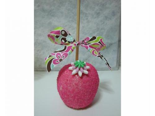 Manzana rosa con moño
