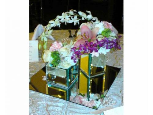 Centro de mesa con base de espejo