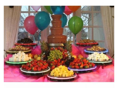 Fuente de chocolate y frutas para cubrir