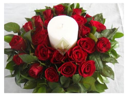 Centro de mesa con rosas rojas