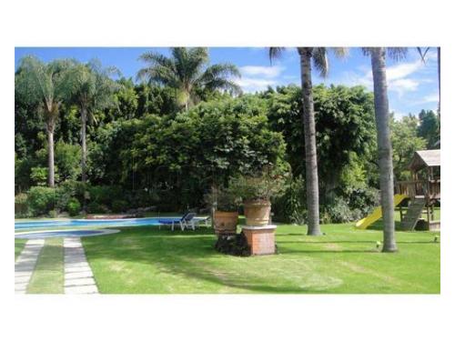 Alberca y área de juegos para los niños