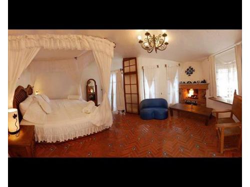 Habitación de novios con cama queen size