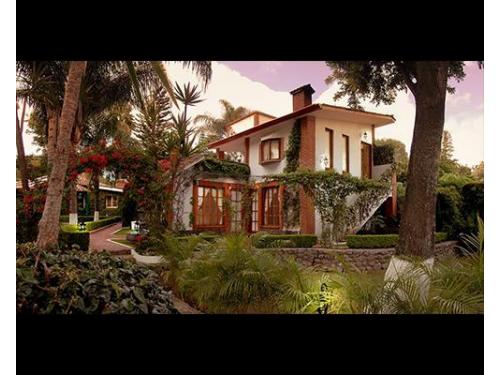 Habitación con jardines