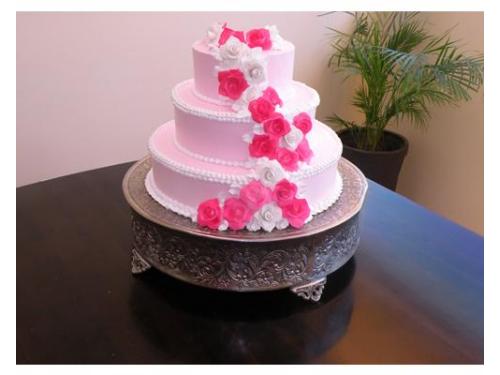 Pasteles con flores color rosa