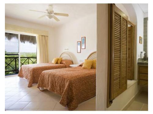 Habitación con dos camas matrimoniales