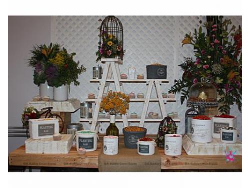 Mesa de postres y boatanas