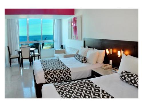 Jr. suite con 2 camas matrimoniales